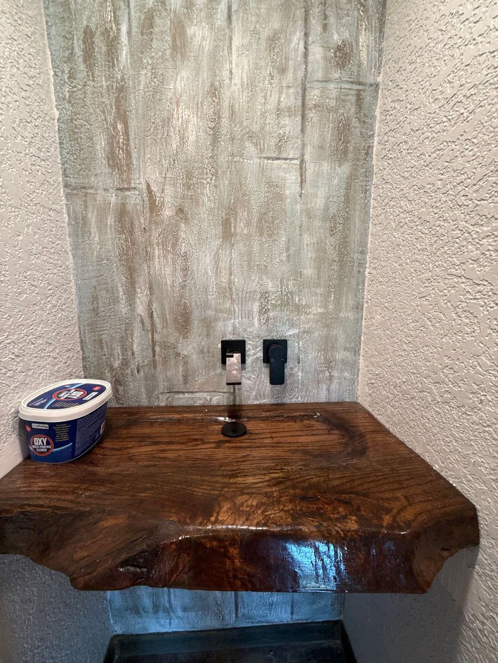 Custom paint and texture with floating sink in Texarkana.