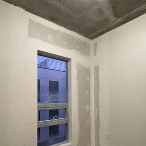 Drywall in the installation/repair stage.