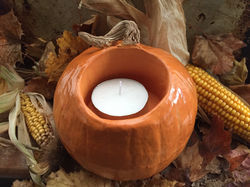 Pumpkin with corn and leaves