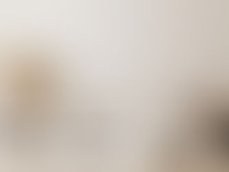 Cozy beige living room with warm neutral paint color creating a comfortable Arizona home interior