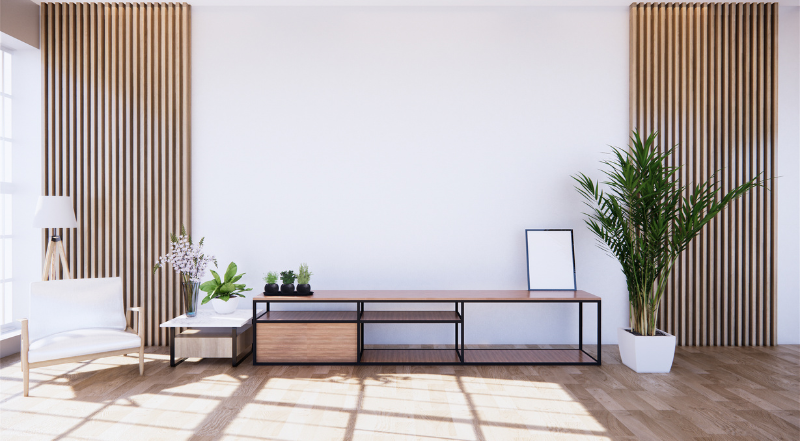 A modern, minimalist living room with soft neutral walls painted using zero-VOC paint for a fresh and eco-friendly look.