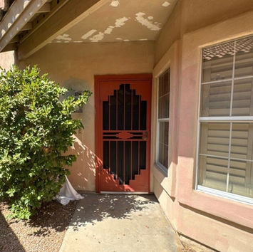 Front entry porch of Mesa home before exterior repaint
