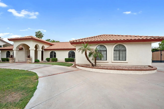 Gilbert painters providing exterior house painting for stucco home in Gilbert AZ