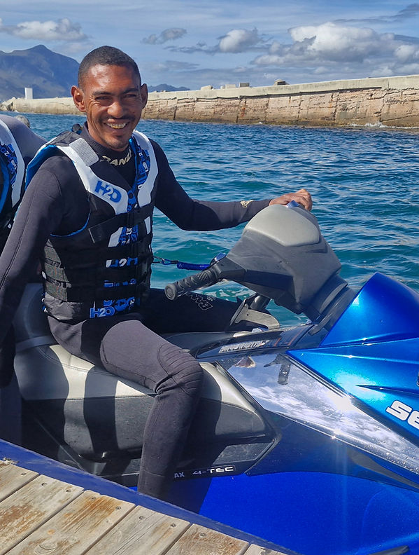 Jerome sitting on a Jetski