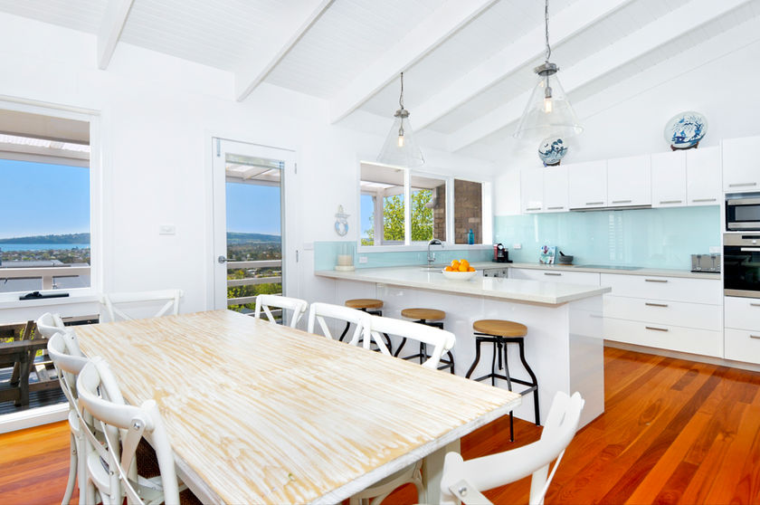 Modern kitchen and dining in a Melbourne property.