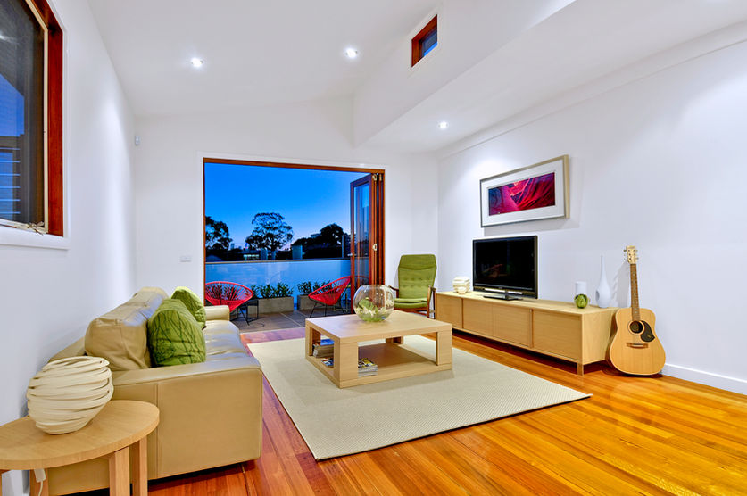 Modern melbourne property living room with balcony access