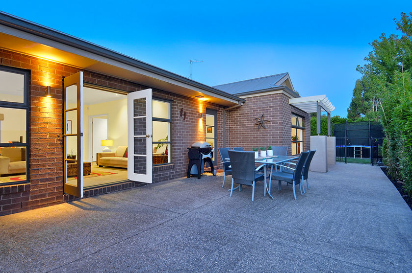 Outdoor patio and dining area of a Melbourne property.
