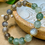 Thumbnail: Natural Green Rutilated Quartz with Gray Moonstones
