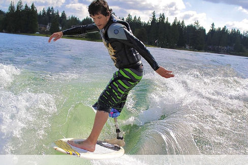 Amputee wakeboarding in the Northern Pacific