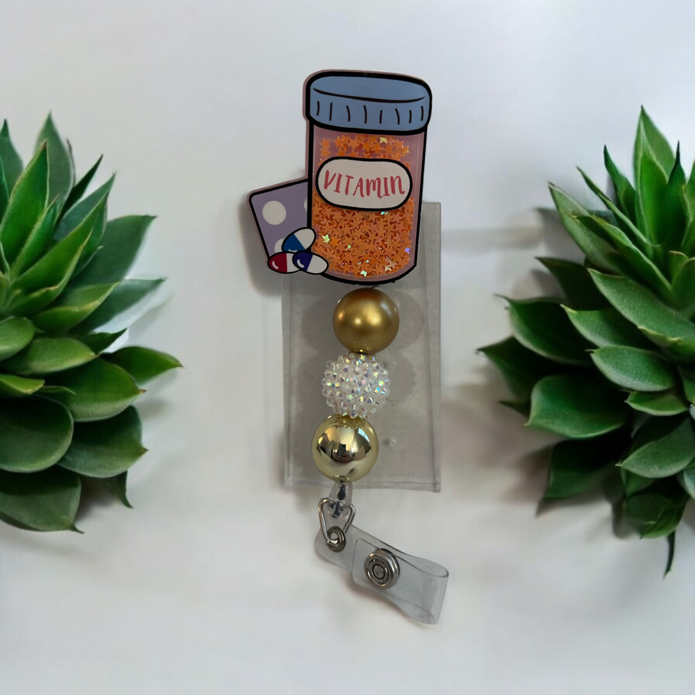 Vitamin Badge reel