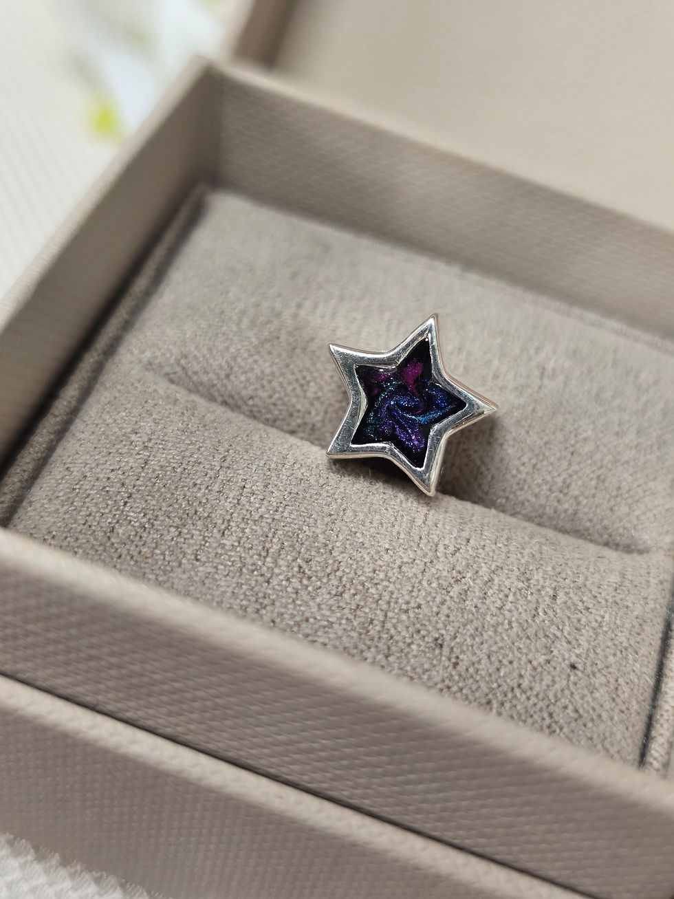 Thumbnail: The Asteria Charm