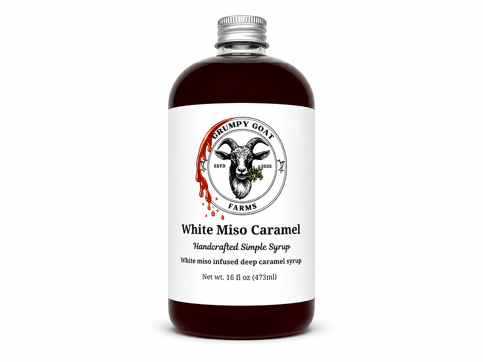 Bottle of white miso caramel infused syrup by Grumpy Goat Farms
