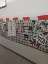 Mural nun corredor con proxectos e extintor, 'ANTIA PEREZ'