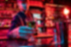 barman proposing alcoholic cocktails shots beverages guest multicolored