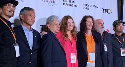 A Long March director, producers, featured talent pose on red carpet Oct 2021