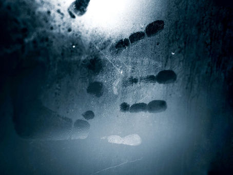 A handprint on the glass | Image Source: Pexels