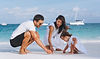 young-family-with-little-daugher-vacation-by-ocean.jpg