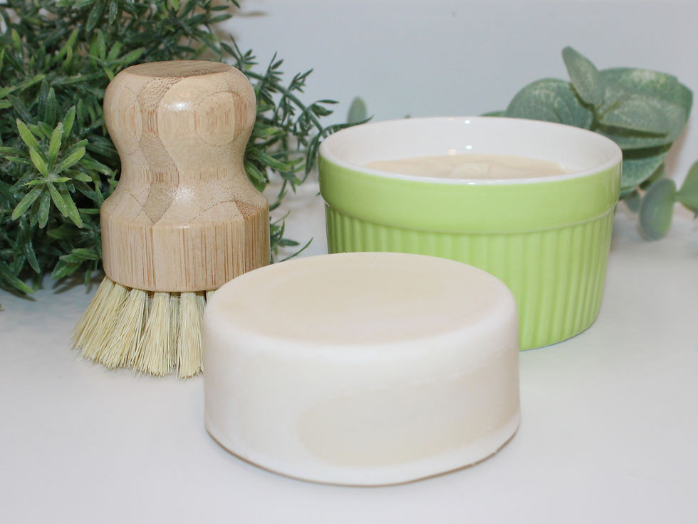 Thumbnail: Solid dish soap refill puck with ceramic ramekin and bamboo scrub brush set in the background