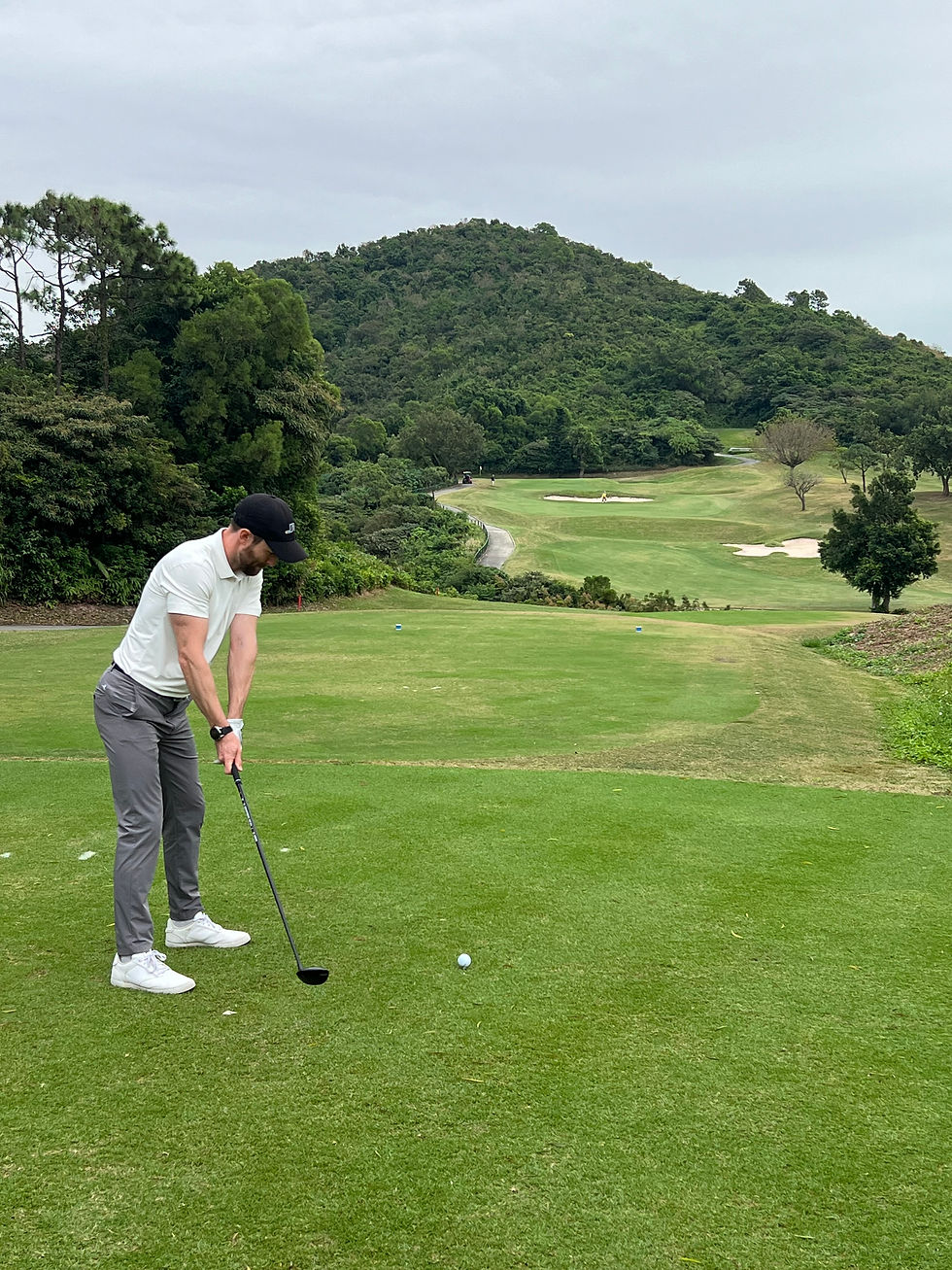 Matt wearing Kalep Performance Polo and Shorts on Hong Kong golf course