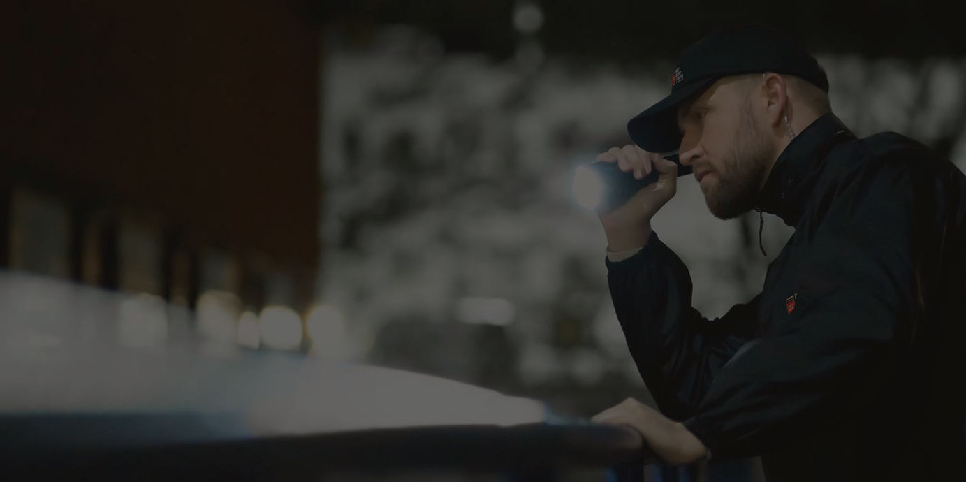 2000x690-DSC-Security-Guard-with-torch_e