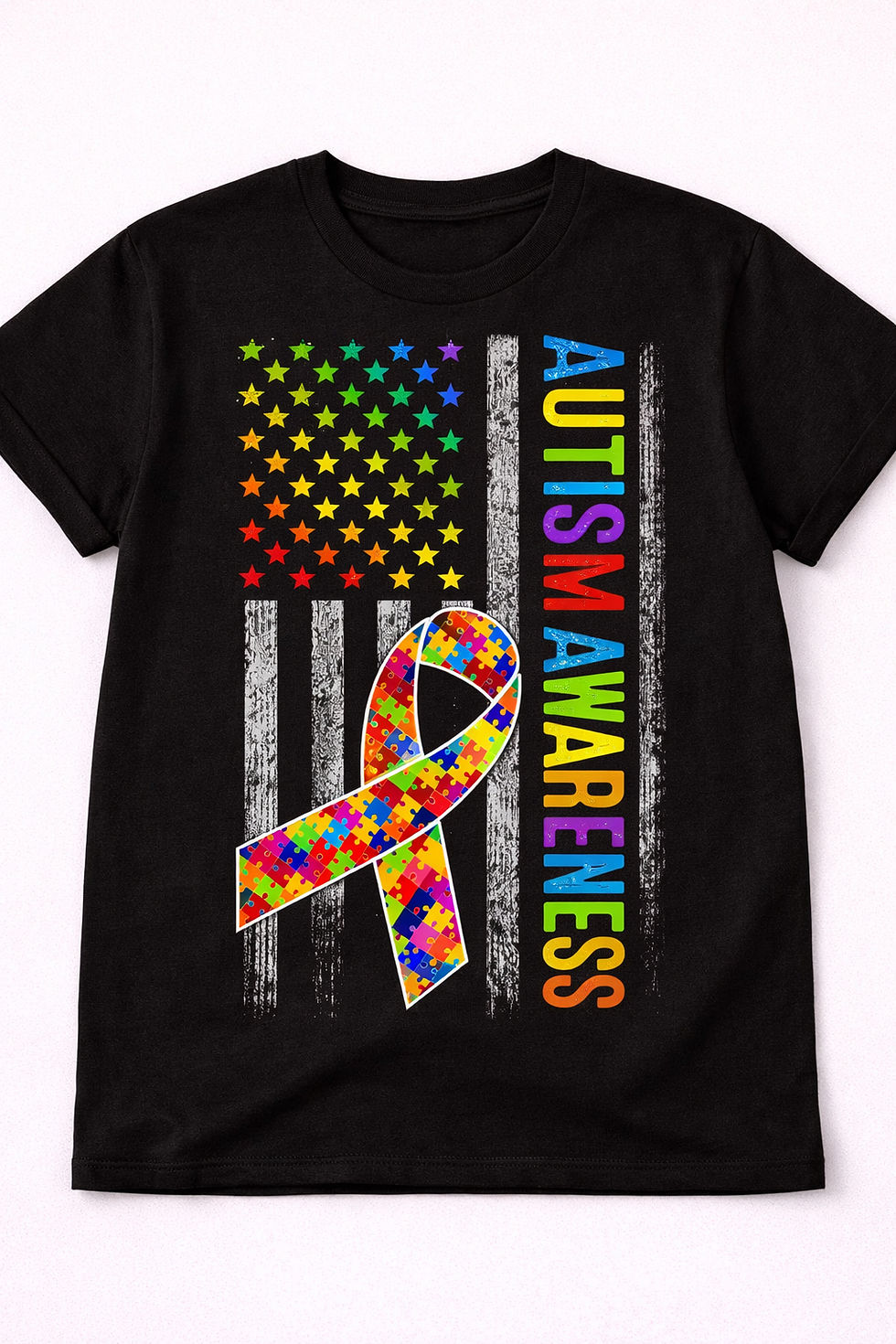 Thumbnail: Autism Awareness Flag Tee with rainbow puzzle design and text