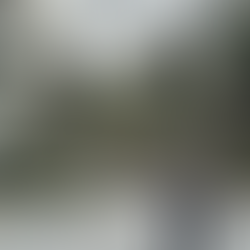 The famous Lombard Street in San Francisco, known for its steep, winding turns lined with colorful flowers and surrounded by city views