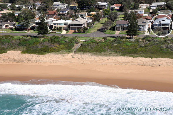 Aerial view of Sundara Beach House Gerringong overlooking Werri Beach and ocean