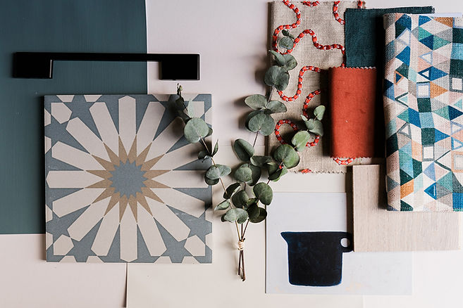 A colourful mood board using the colours blue and terracotta.