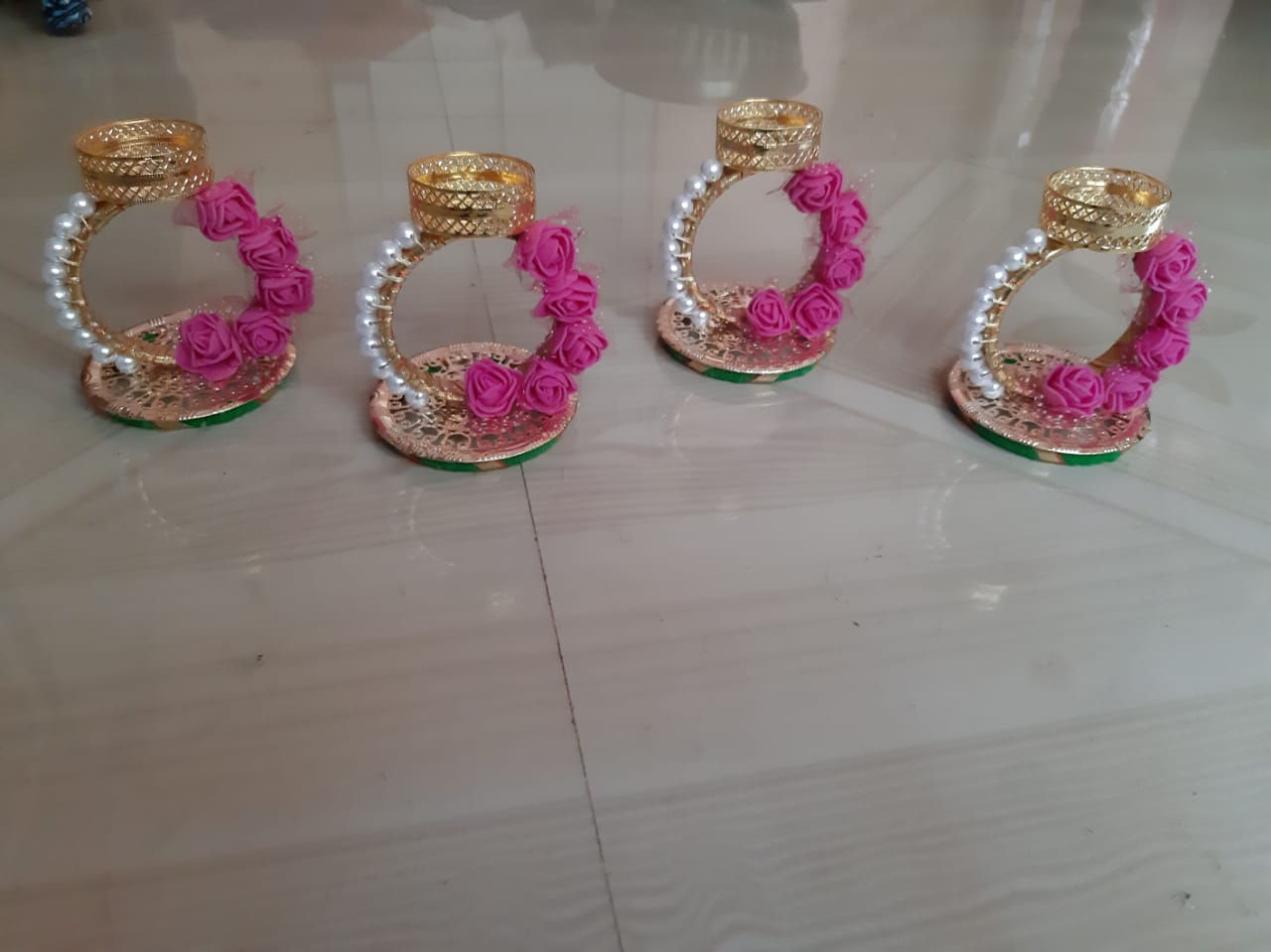 FOUR SET OF DIYA'S