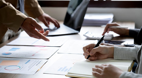 business-people-meeting-using-laptop-computer-calc-2022-11-28-18-03-18-utc.jpg