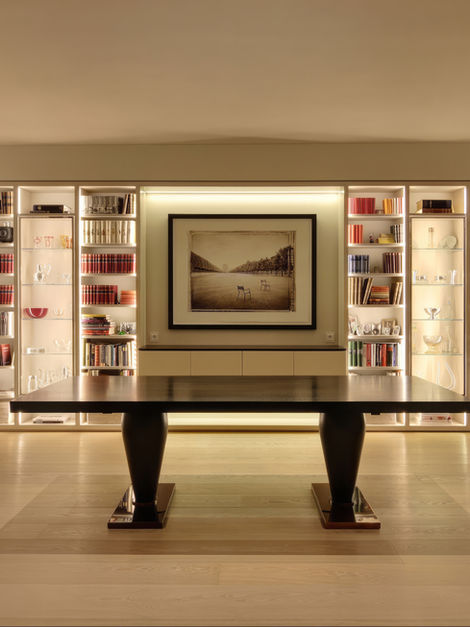 Warm wood plank flooring beneath a pool table