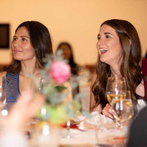Two-Women-Smiling-at-an-Event (1).jpg