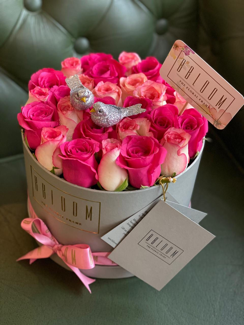 Thumbnail: Luxe two tone bucket of roses with birdies