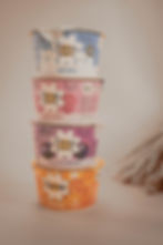Stacked yoghurt pots.