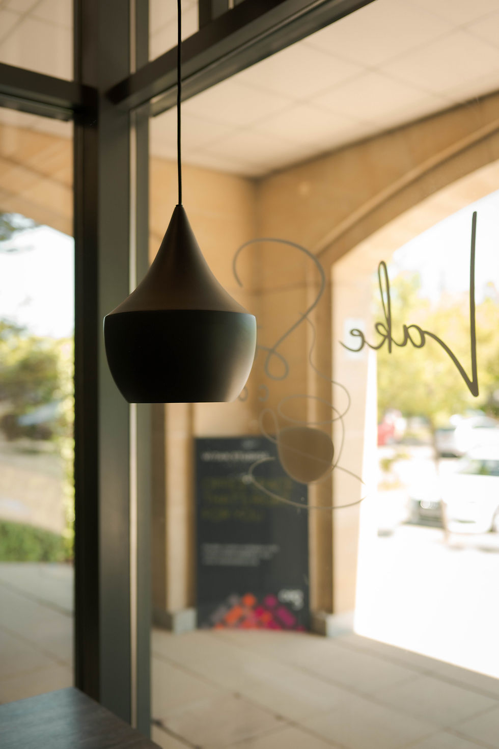 Café interior with pendant lighting at Lake Street Coffee, Milton Keynes — Fourteen Lakes