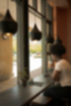 Customer relaxing in Lake Street Coffee café