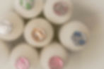 Assorted bottled milk TOP VIEW and dairy alternatives on a neutral background.