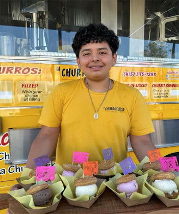 Boy with ice cream sandwiches.