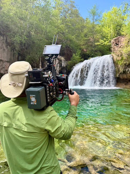 Cameraman filming a waterfall for AOT Vibrant Arizona.