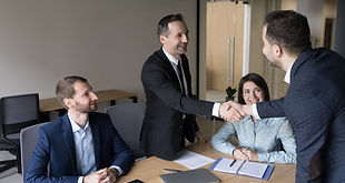 boardroom meeting successful conclusion.jpg