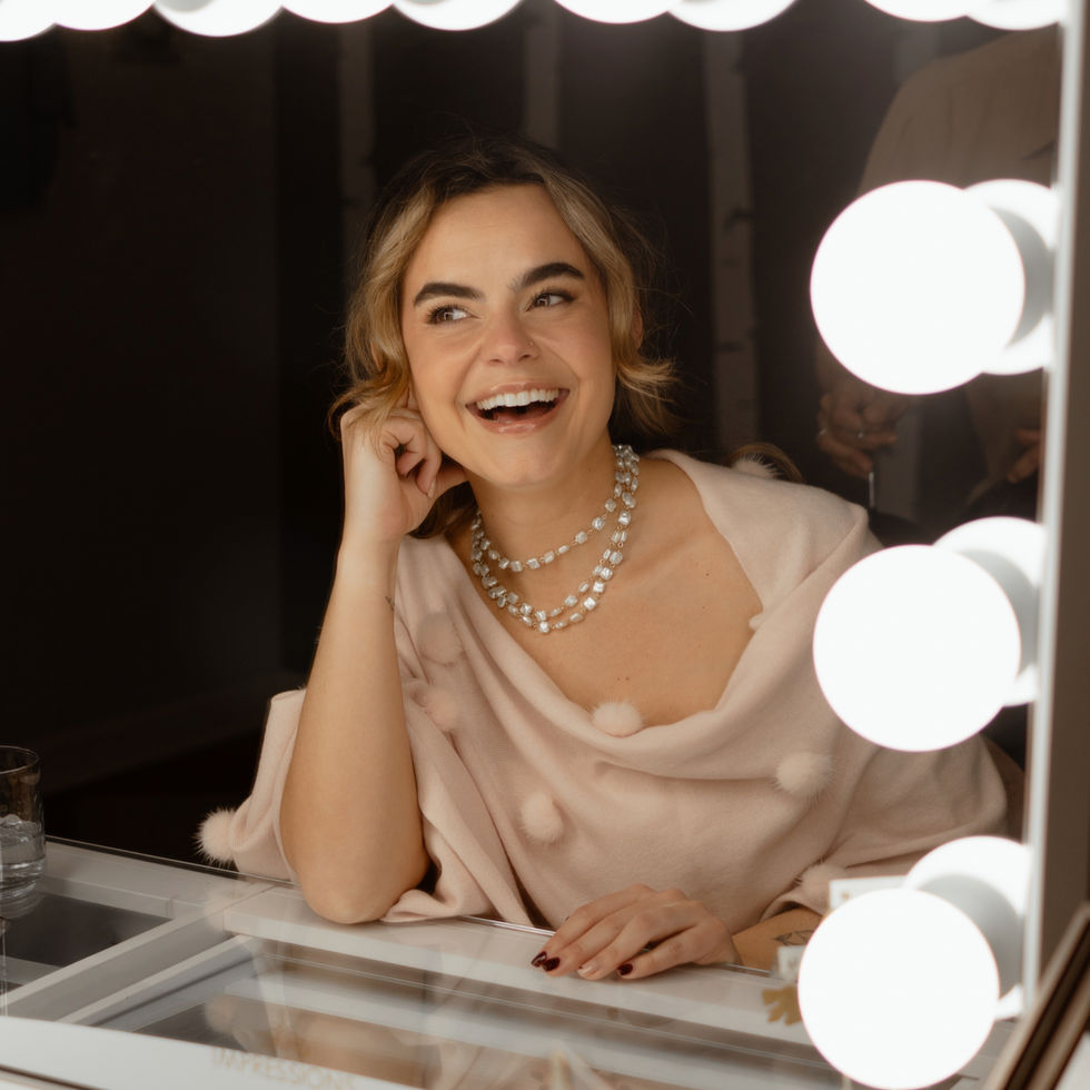 Model wearing Loulou Layered Necklace styled with a silk top by Menzaman Jewelry