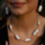 Model wearing Loulou Baroque Necklace and matching Loulou Baroque Earrings by Menzaman Jewelry