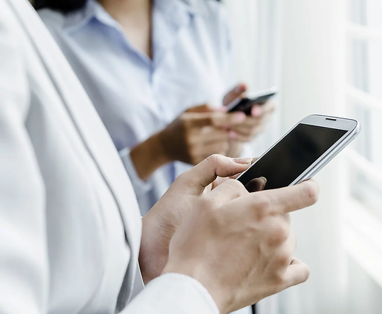 Holding Phones.webp