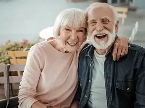 An_old_couple_smiling_37fd0fe4e9.webp