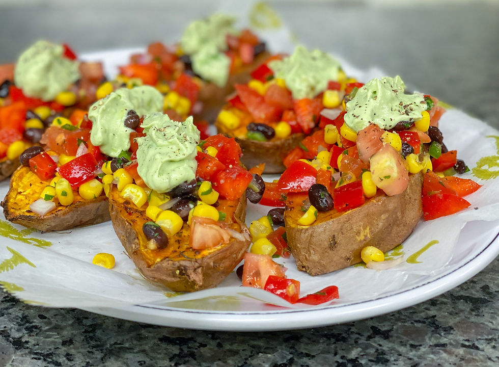 Fiesta Roasted Sweet Potatoes topped with a Corn Salsa with an Avocado Crema