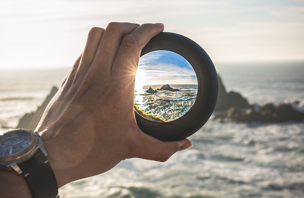 Focus, camera lens rocks in the ocean, sea landscape