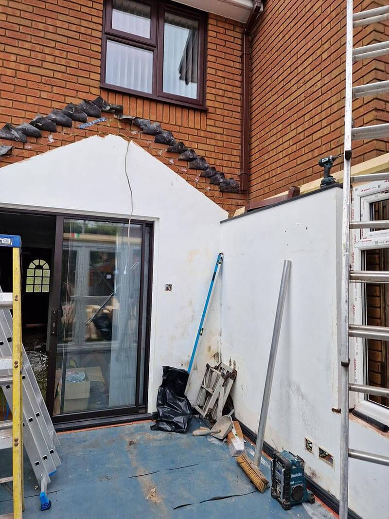 The first step was to remove the old polycarbonate roof
