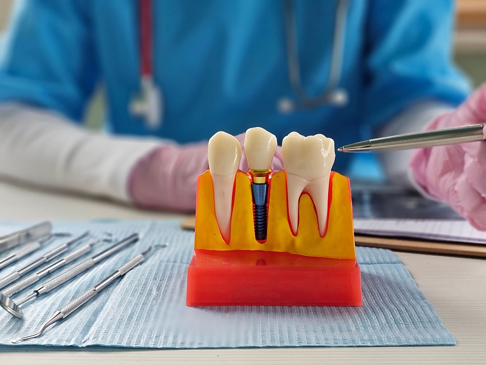 Dentist consulting patient about dental implant options in a modern dental office