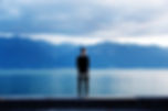 Man Looking Out to the Mountains