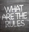 What Are The Rules? written on a chalkbo